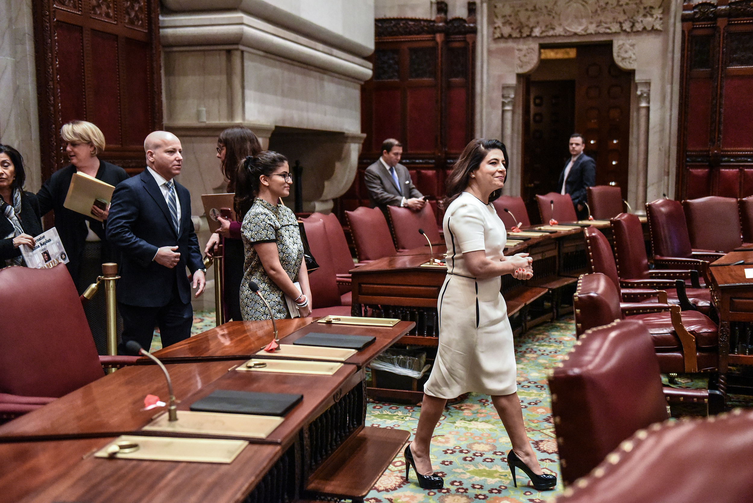Senator Anna Kaplan walks into the Senate Chamber before the swearing in of the Senators in Albany, NY, U.S., on January 9, 2019. (Stephanie Keith for The New York Times)